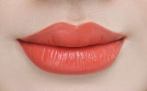 hình ảnh phun môi màu cam đào